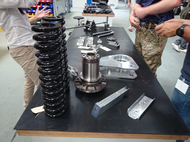 Various bits and pieces were out on display, including suspension springs, front wheel hubs and brake components.